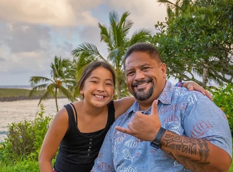 Kalani Flores with his daughter