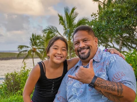 Kalani Flores with his daughter