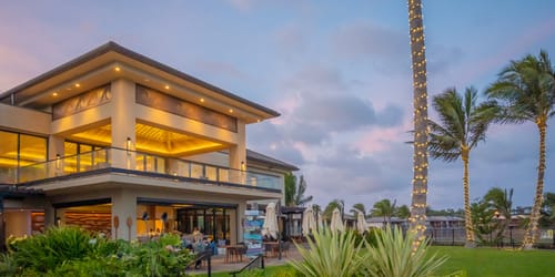 Hualanis oceanfront restaurant lit up for the holidays in Kauai