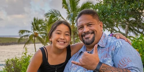Kalani Flores with his daughter